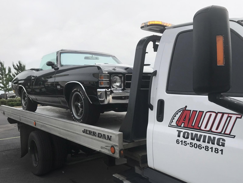 Towing a Classic Car on an All Out Towing Flatbed Tow Truck In Nashville